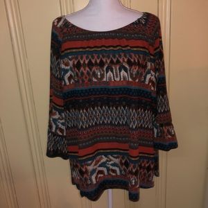 orange and brown blouse